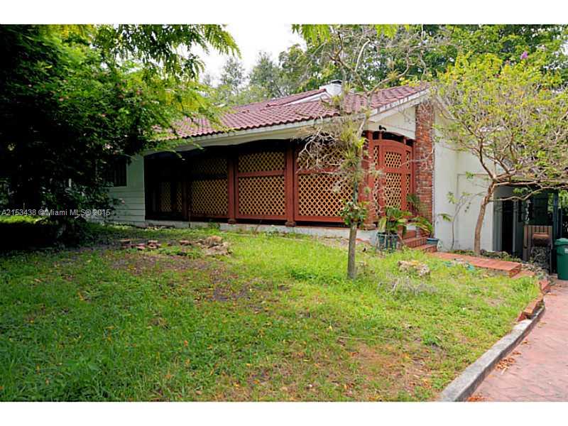 6440 Southwest 69th Avenue Miami, FL 33143 - Photo 1 of 20 a backyard of a house with seating space