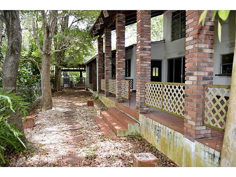 6440 Southwest 69th Avenue Miami, FL 33143 - Photo 18 of 20 a view of a porch with a bench