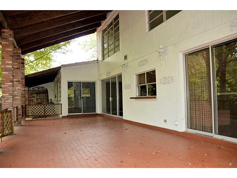 6440 Southwest 69th Avenue Miami, FL 33143 - Photo 19 of 20 a view of a house with porch