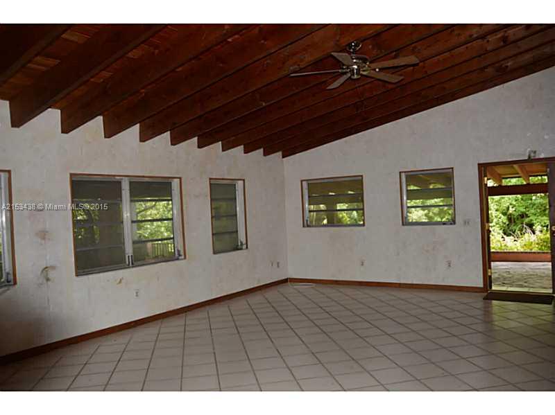 6440 Southwest 69th Avenue Miami, FL 33143 - Photo 3 of 20 a view of an empty room with a window