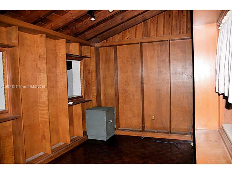 6440 Southwest 69th Avenue Miami, FL 33143 - Photo 4 of 20 a view of an empty room with wooden floor