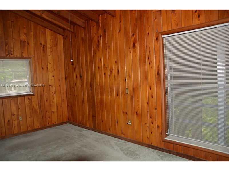 6440 Southwest 69th Avenue Miami, FL 33143 - Photo 7 of 20 a view of wooden door