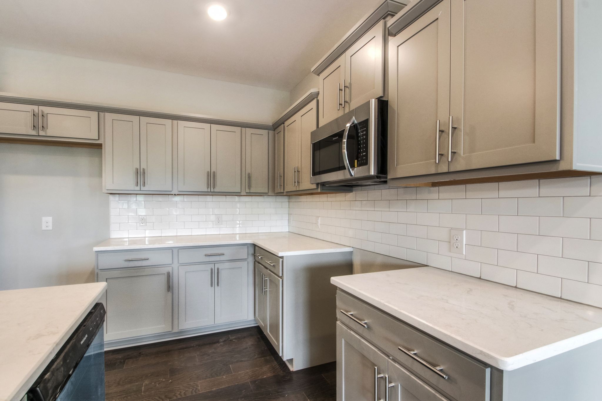 4000 Shadow Green Drive, Unit 4305 Franklin, TN 37064 - Photo 11 of 24 a kitchen with stainless steel appliances granite countertop a sink stove and microwave