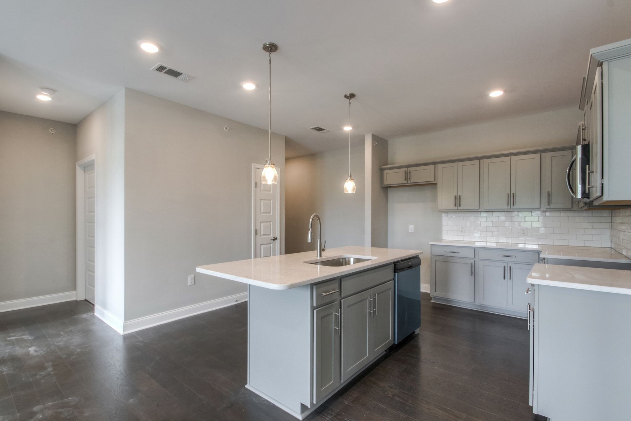 4000 Shadow Green Drive, Unit 4305 Franklin, TN 37064 - Photo 13 of 24 a kitchen with a sink a stove a refrigerator and a refrigerator
