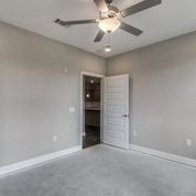 4000 Shadow Green Drive, Unit 4305 Franklin, TN 37064 - Photo 17 of 24 en empty room with a ceiling fan and a ceiling fan