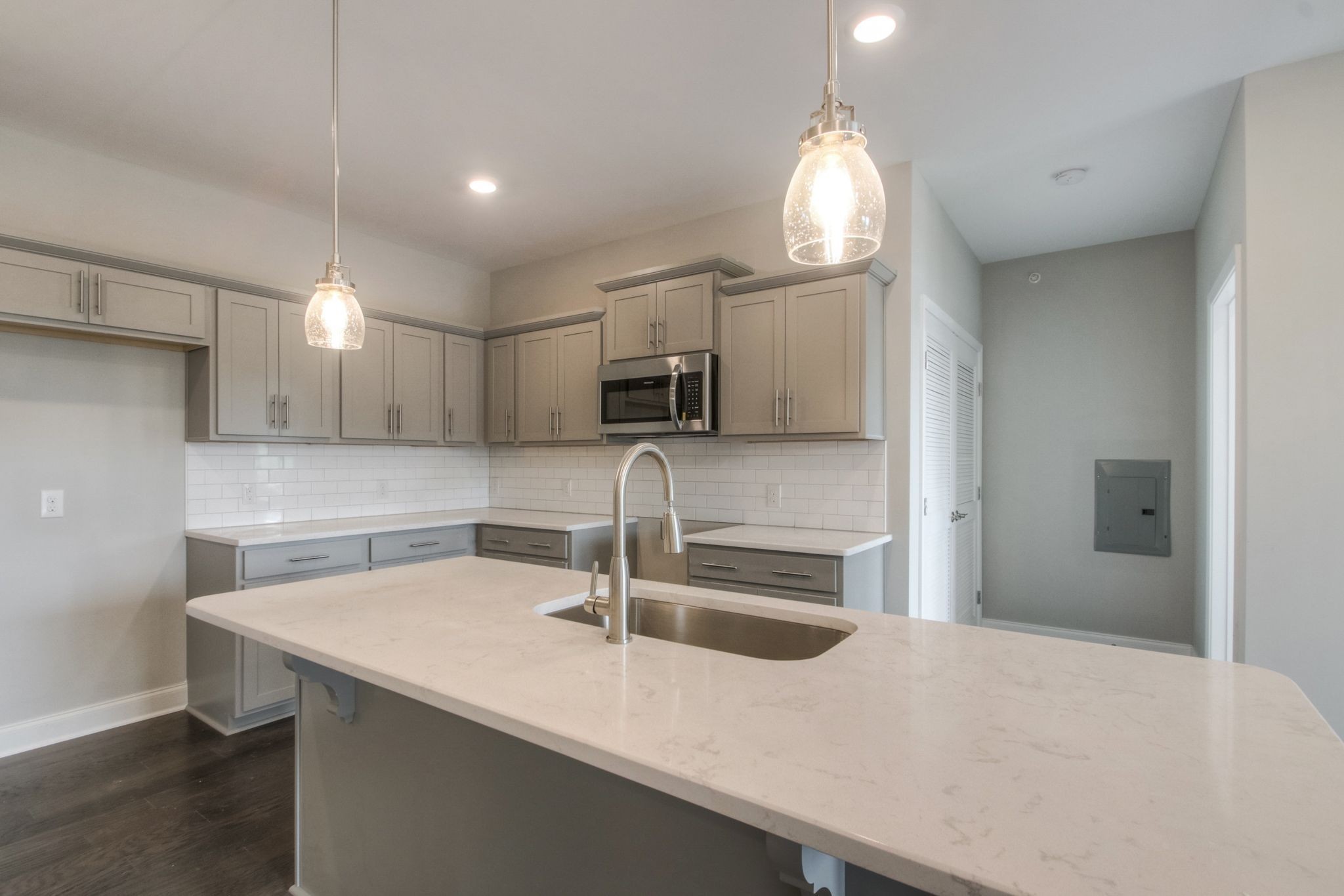 4000 Shadow Green Drive, Unit 4305 Franklin, TN 37064 - Photo 10 of 24 a kitchen with a sink a counter space cabinets and stainless steel appliances
