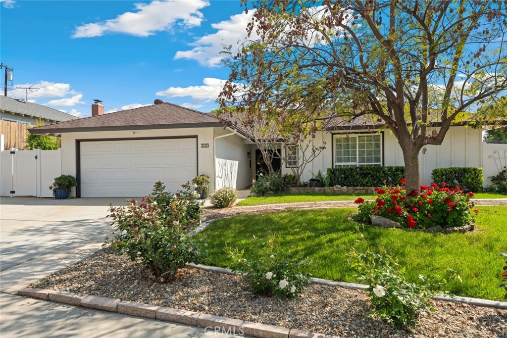 330 Spruce Street Riverside, CA 92507 - Photo 1 of 1 a view of a house with a garden