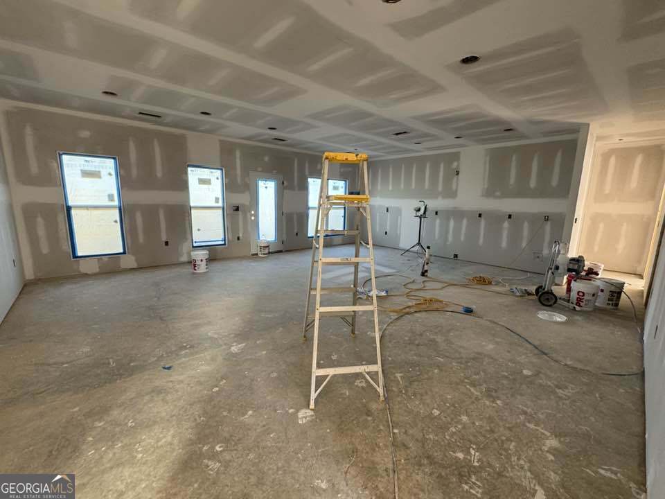 1247 Mark Wood Road Dexter, GA 31019 - Photo 3 of 5 a view of a room with gym equipment