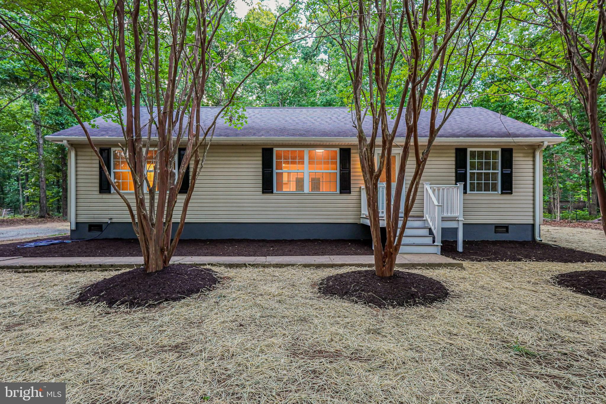 767 Loving Road Zion Crossroads, VA 22942 - Photo 1 of 33 a front view of a house with garden
