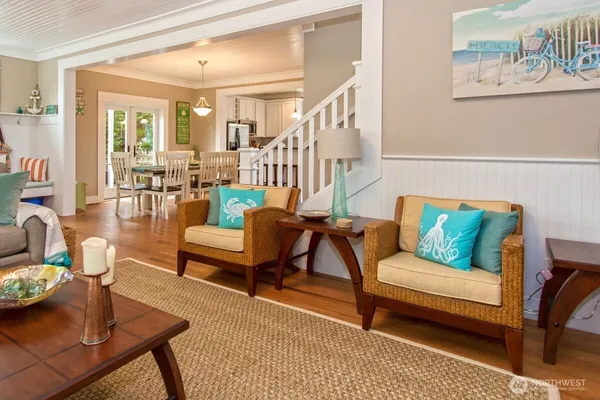 a living room with furniture and a table