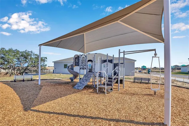 a view of a dining room with wooden floor