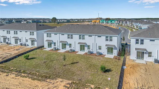 a view of house with yard