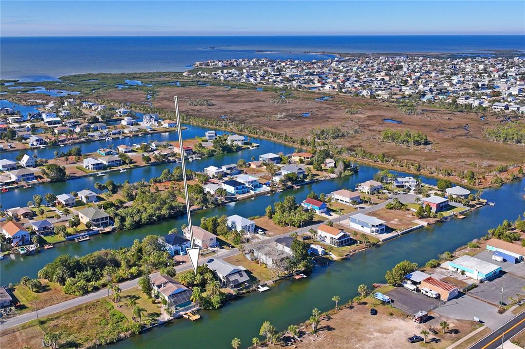 3344 Fernleaf Drive Hernando Beach, FL 34607 - Photo 13 of 22 a view of a city with an ocean view
