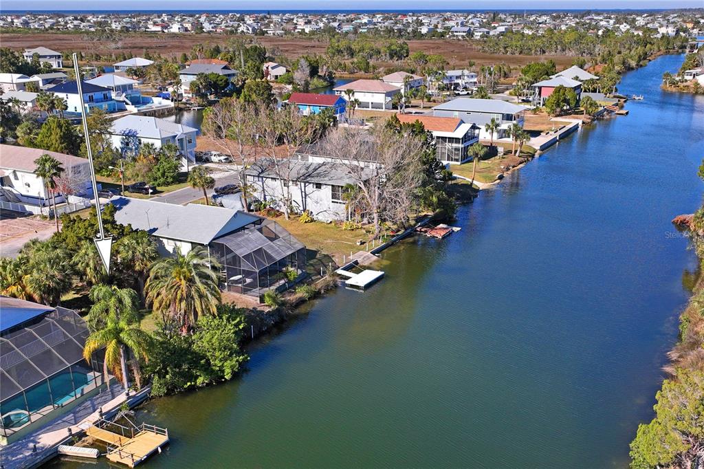 3344 Fernleaf Drive Hernando Beach, FL 34607 - Photo 19 of 22 an aerial view of a houses with yard