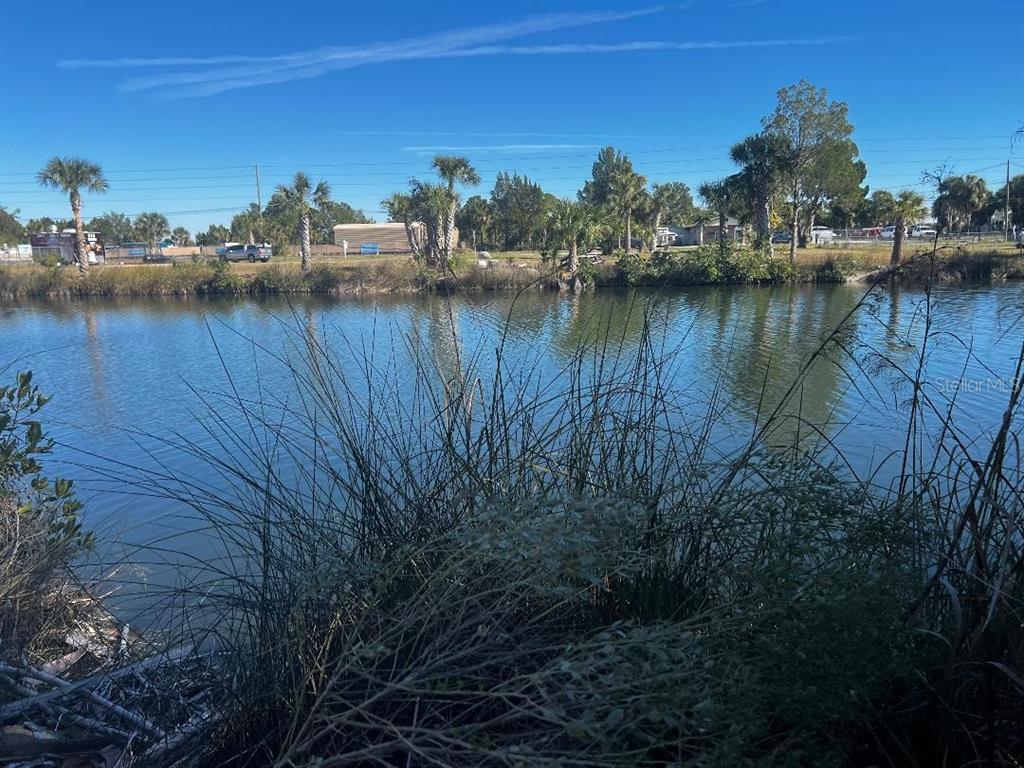 3344 Fernleaf Drive Hernando Beach, FL 34607 - Photo 2 of 22 a view of a lake with houses