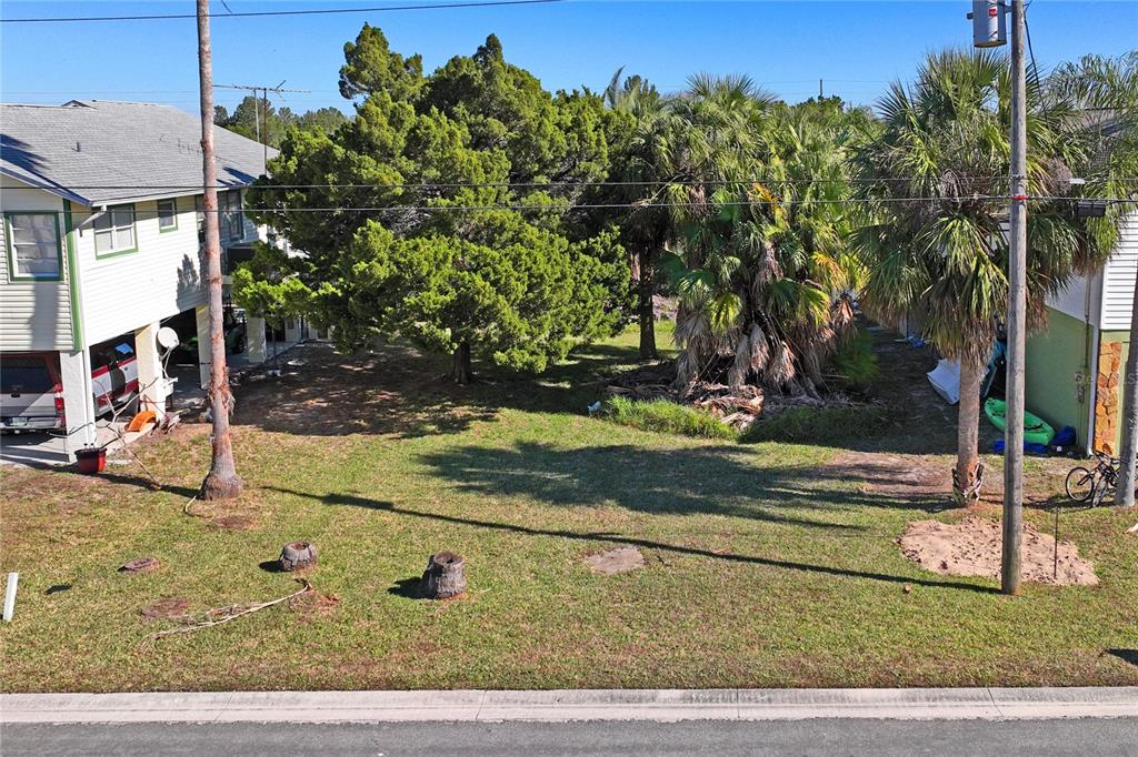 3344 Fernleaf Drive Hernando Beach, FL 34607 - Photo 3 of 22 a view of a house with a yard