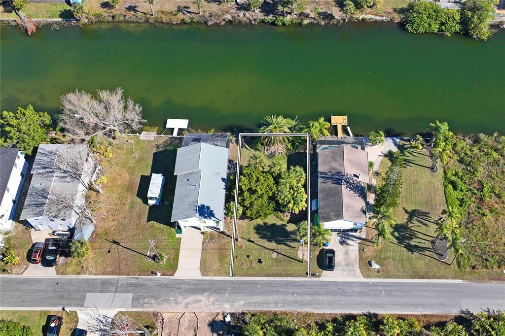 3344 Fernleaf Drive Hernando Beach, FL 34607 - Photo 5 of 22 an aerial view of a house with a lake view