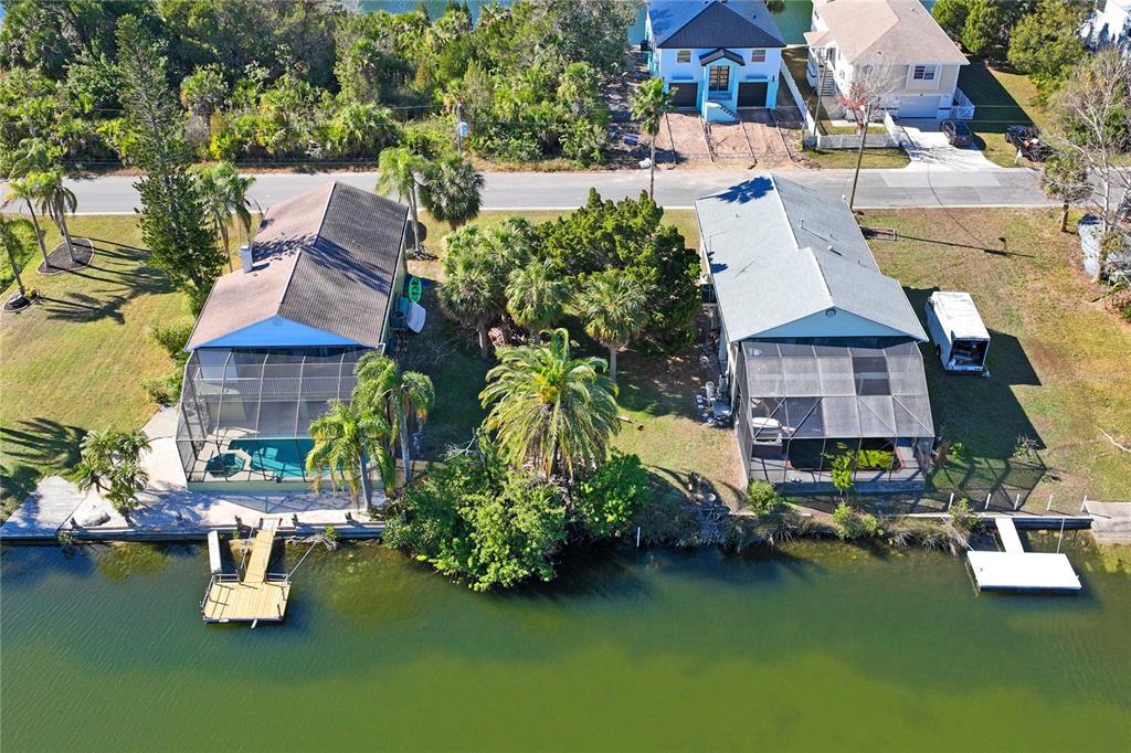 3344 Fernleaf Drive Hernando Beach, FL 34607 - Photo 6 of 22 an aerial view of a house with swimming pool outdoor seating and yard