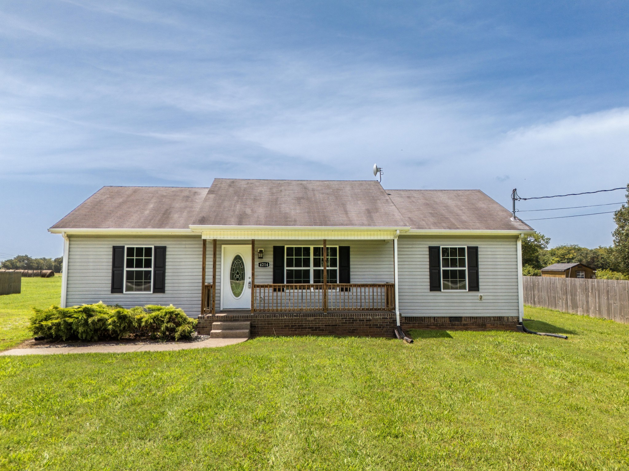 front view of house with a yard