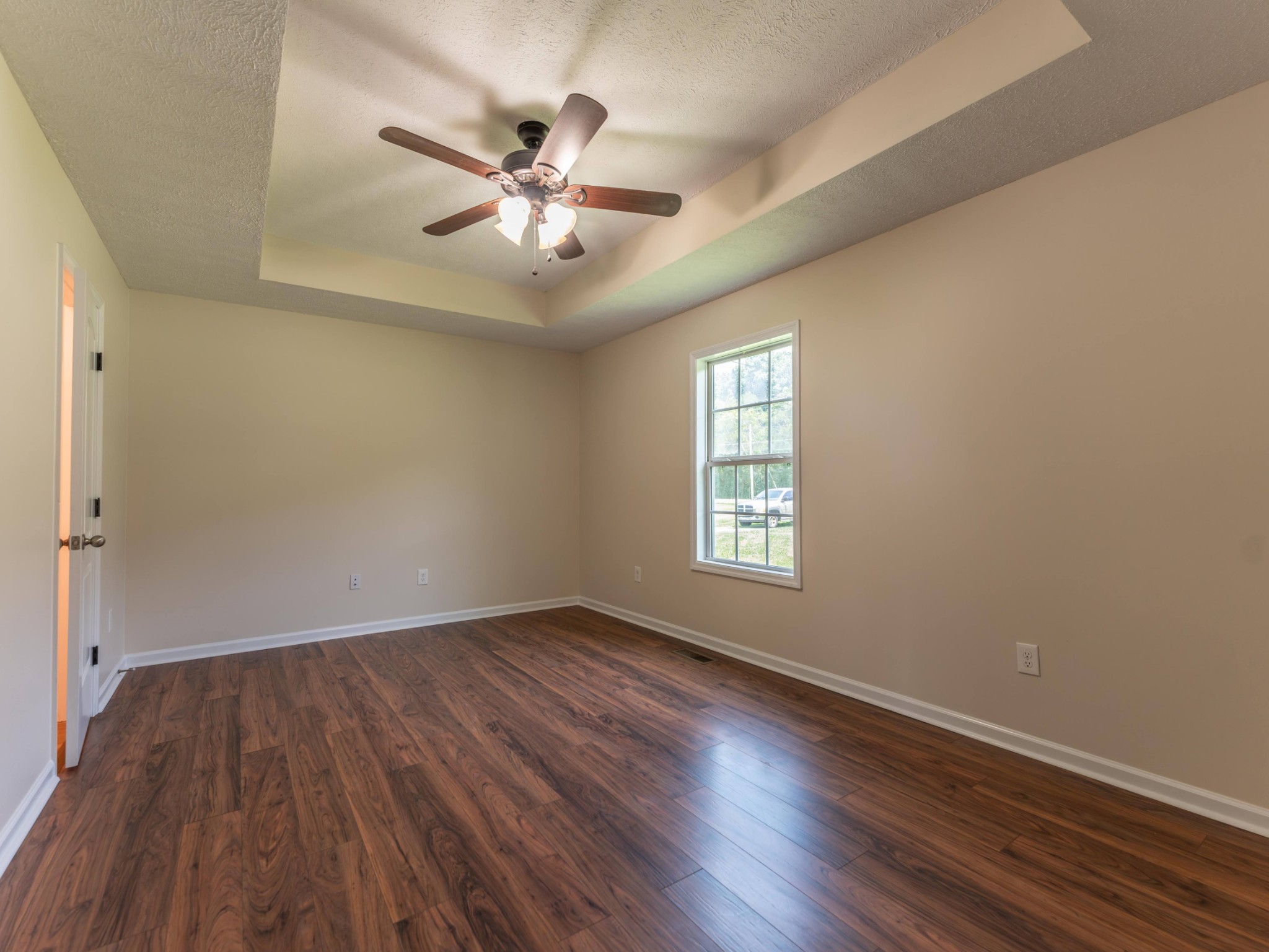 4214 Thick Road Chapel Hill, TN 37034 - Photo 15 of 29 a view of an empty room with wooden floor and a window