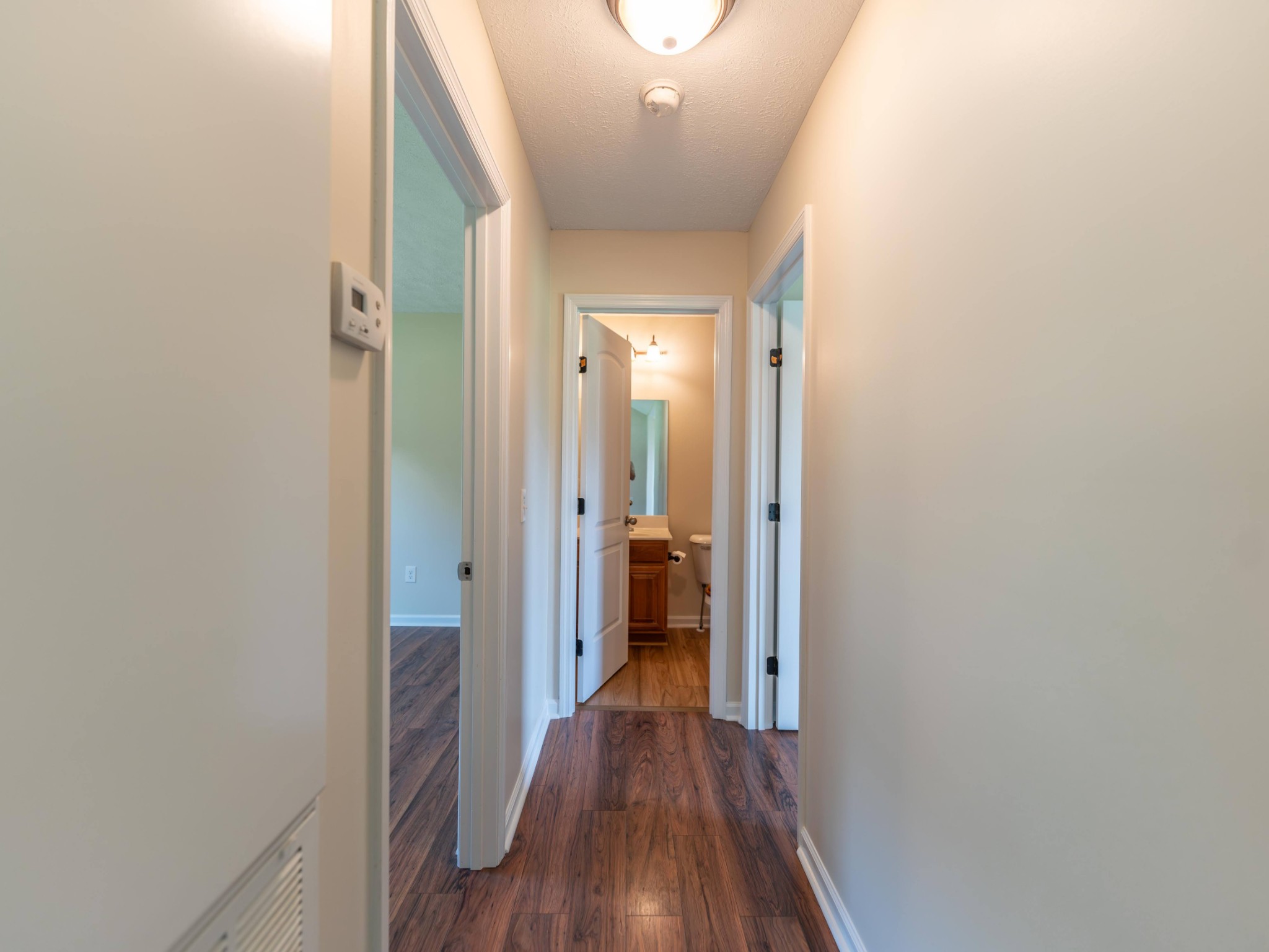 4214 Thick Road Chapel Hill, TN 37034 - Photo 21 of 29 a view of a hallway with wooden floor