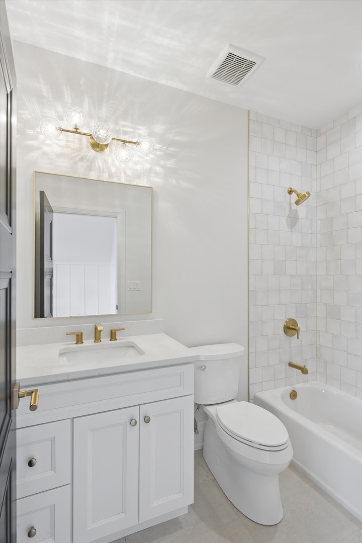 196 Walnut Street Elmhurst, IL 60126 - Photo 21 of 37 a bathroom with a sink a toilet and shower