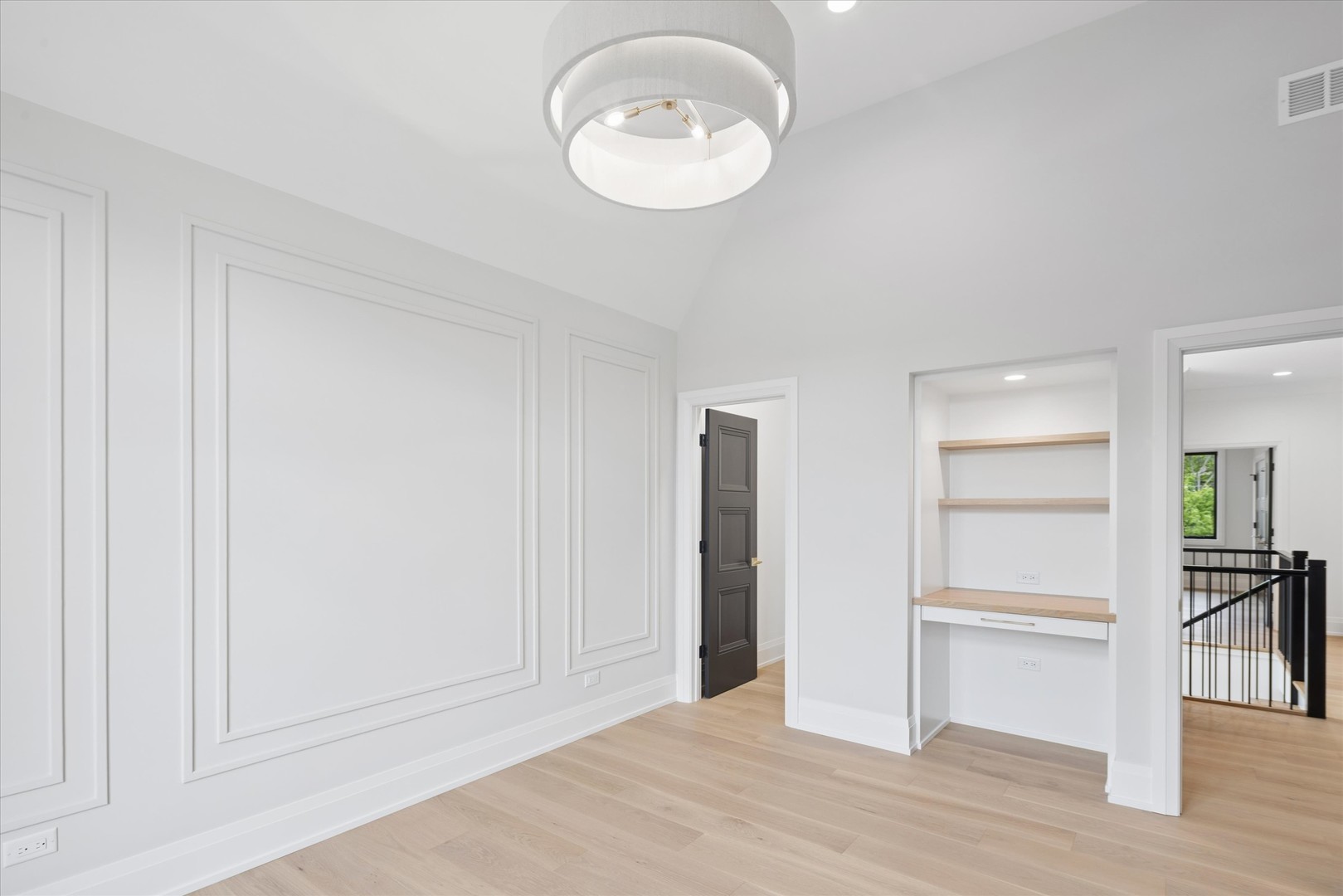 196 Walnut Street Elmhurst, IL 60126 - Photo 25 of 37 a view of an empty room with a window and wooden floor