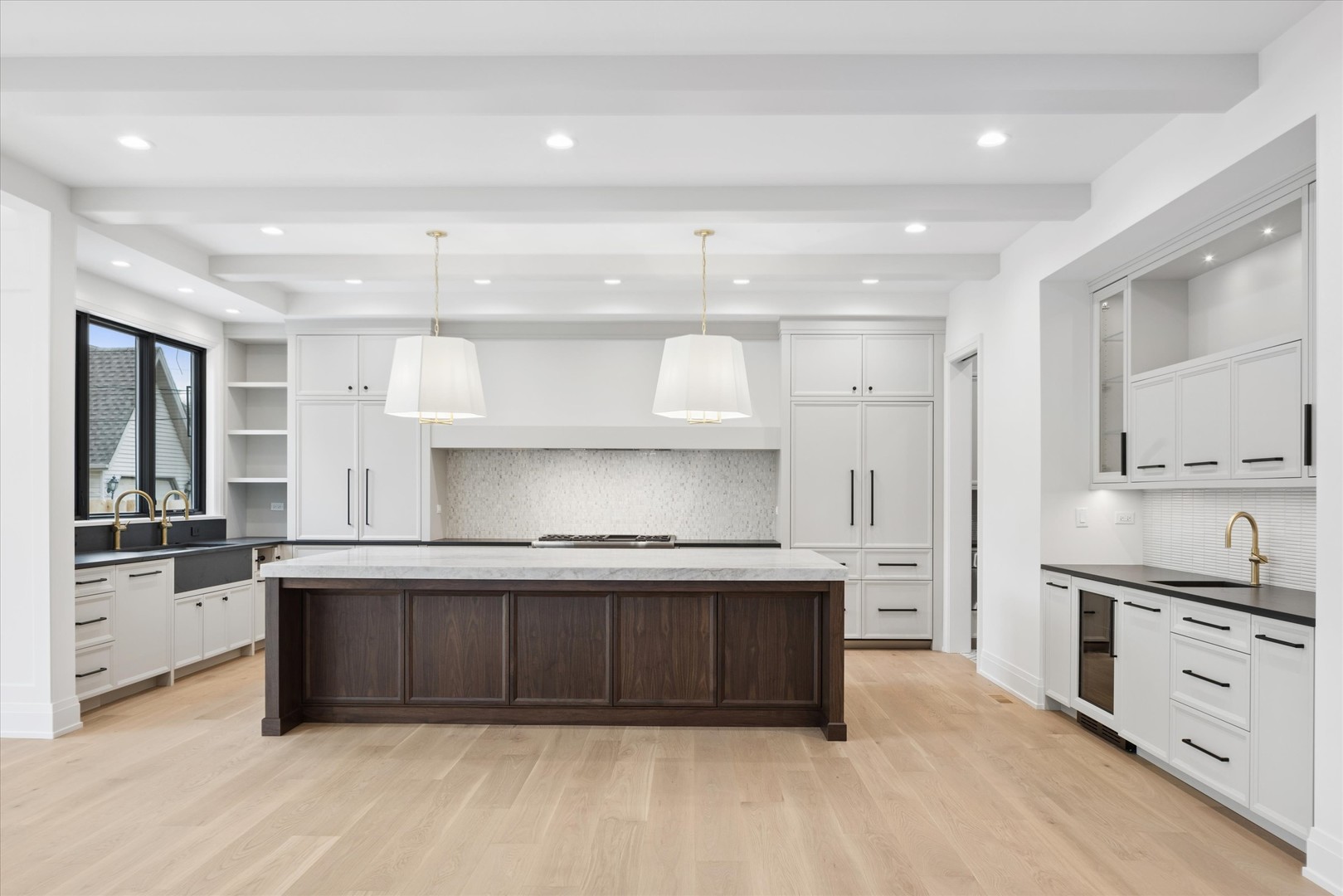196 Walnut Street Elmhurst, IL 60126 - Photo 3 of 37 a large kitchen with stainless steel appliances and a counter top space