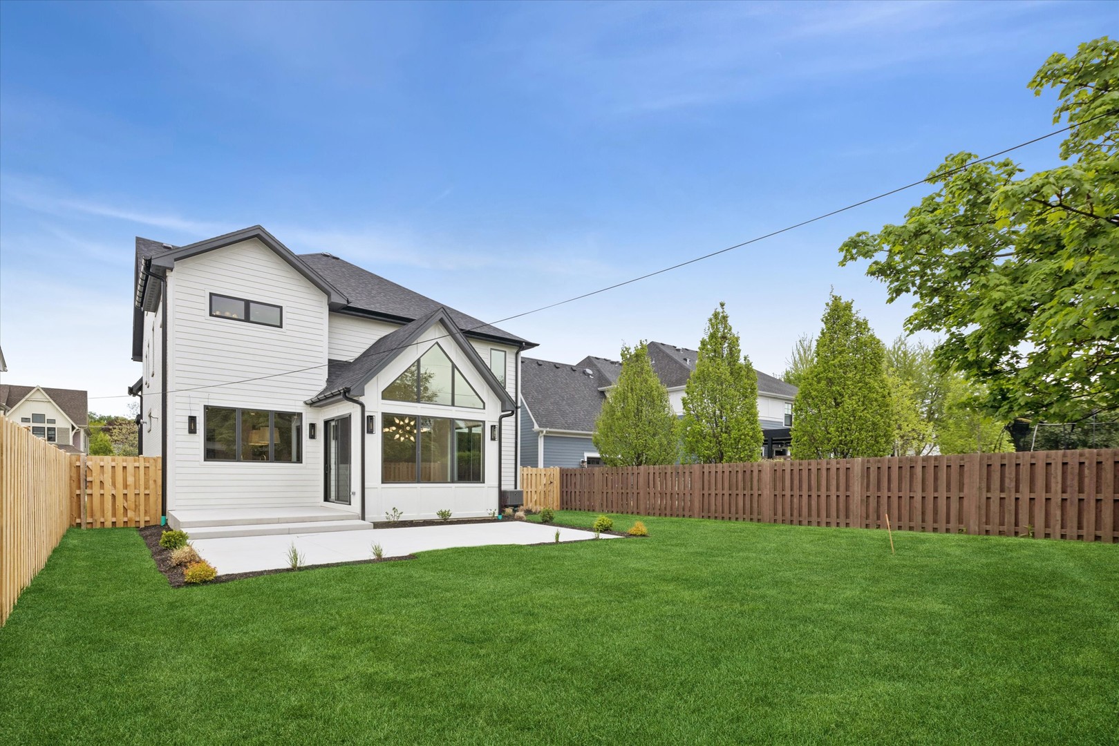 196 Walnut Street Elmhurst, IL 60126 - Photo 37 of 37 a front view of a house with a garden
