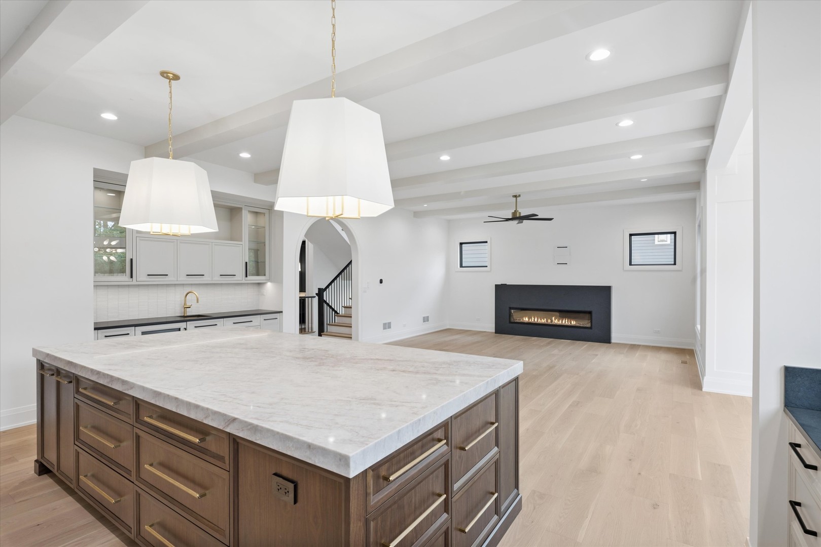 196 Walnut Street Elmhurst, IL 60126 - Photo 7 of 37 a kitchen with kitchen island a sink stainless steel appliances and a counter top space