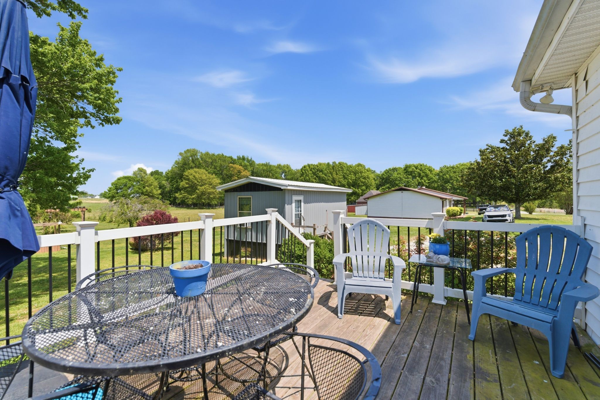 404 Logan Chapel Road Hillsboro, TN 37342 - Photo 23 of 38 a view of house with a deck and furniture