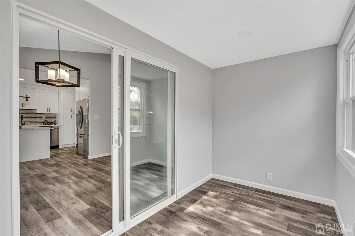 45 Harmon Road Edison, NJ 08837 - Photo 19 of 44 a view of hallway with wooden floor