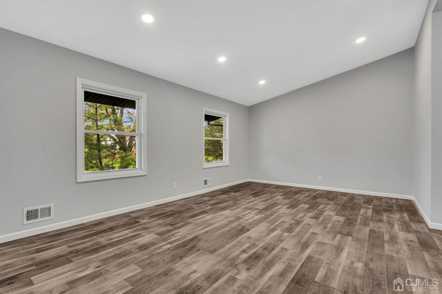 45 Harmon Road Edison, NJ 08837 - Photo 22 of 44 a view of room with window and hardwood floor