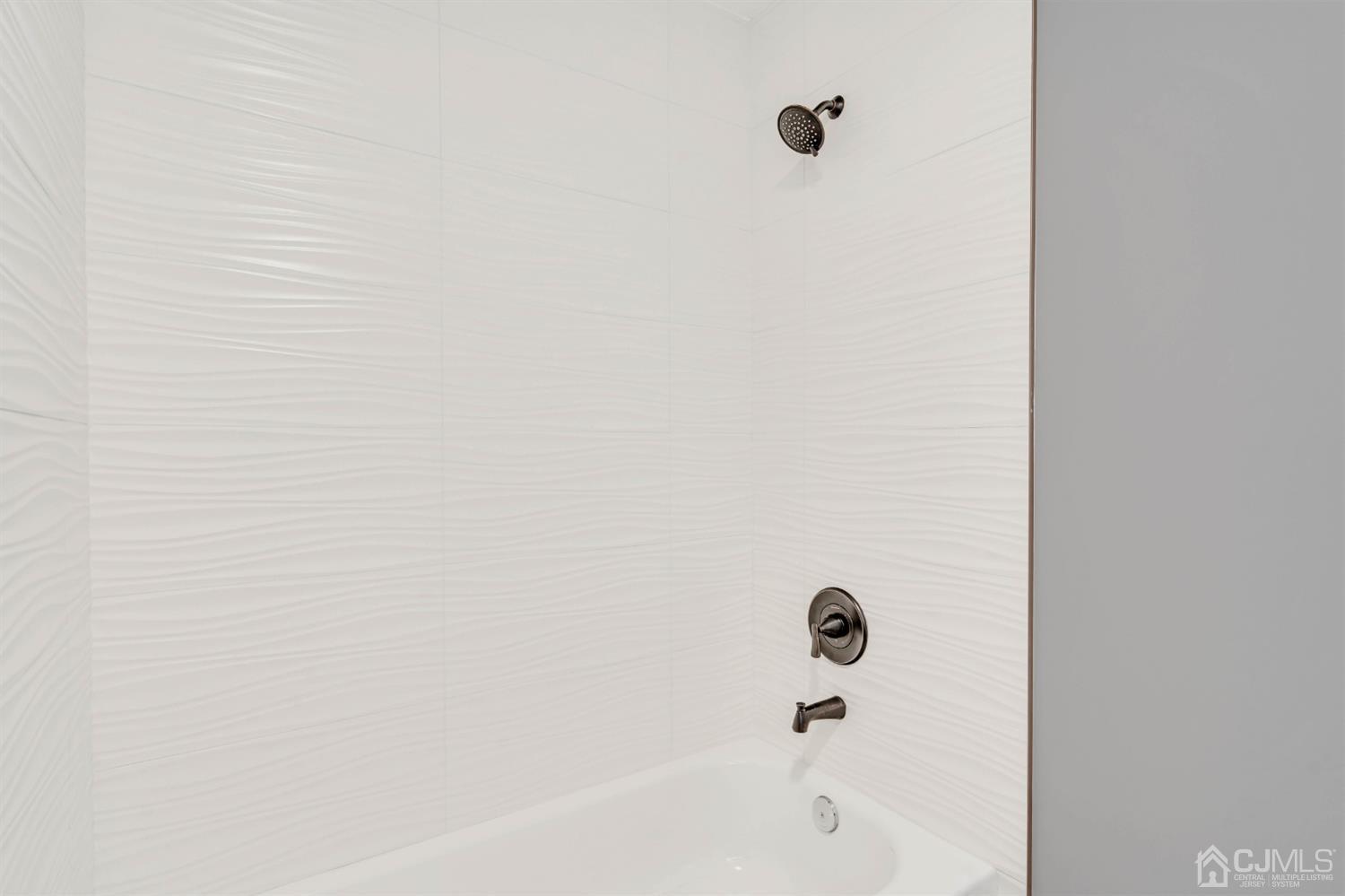 45 Harmon Road Edison, NJ 08837 - Photo 27 of 44 a bathroom with a shower