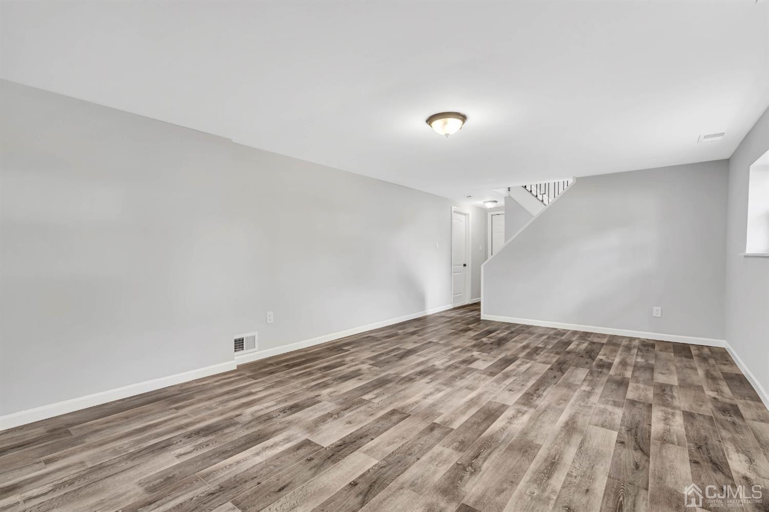 45 Harmon Road Edison, NJ 08837 - Photo 30 of 44 wooden floor in a room