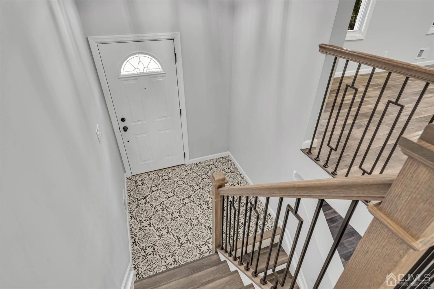 45 Harmon Road Edison, NJ 08837 - Photo 3 of 44 a view of a hallway view with staircase