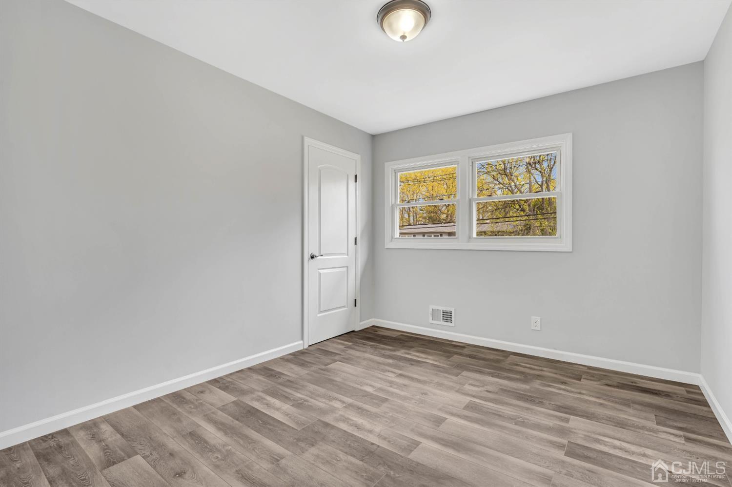 45 Harmon Road Edison, NJ 08837 - Photo 34 of 44 an empty room with a window