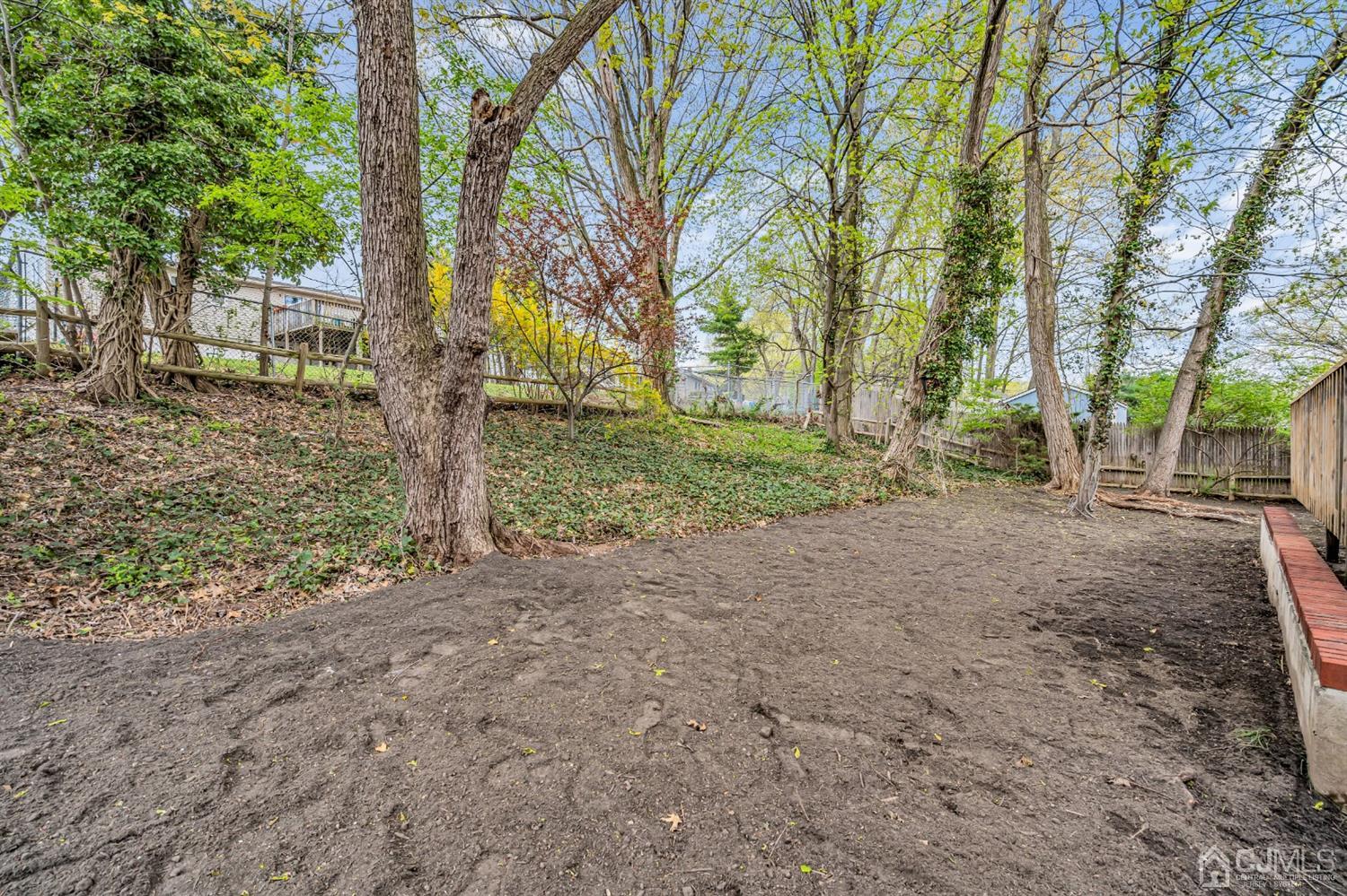 45 Harmon Road Edison, NJ 08837 - Photo 43 of 44 a view of a yard with plants and trees