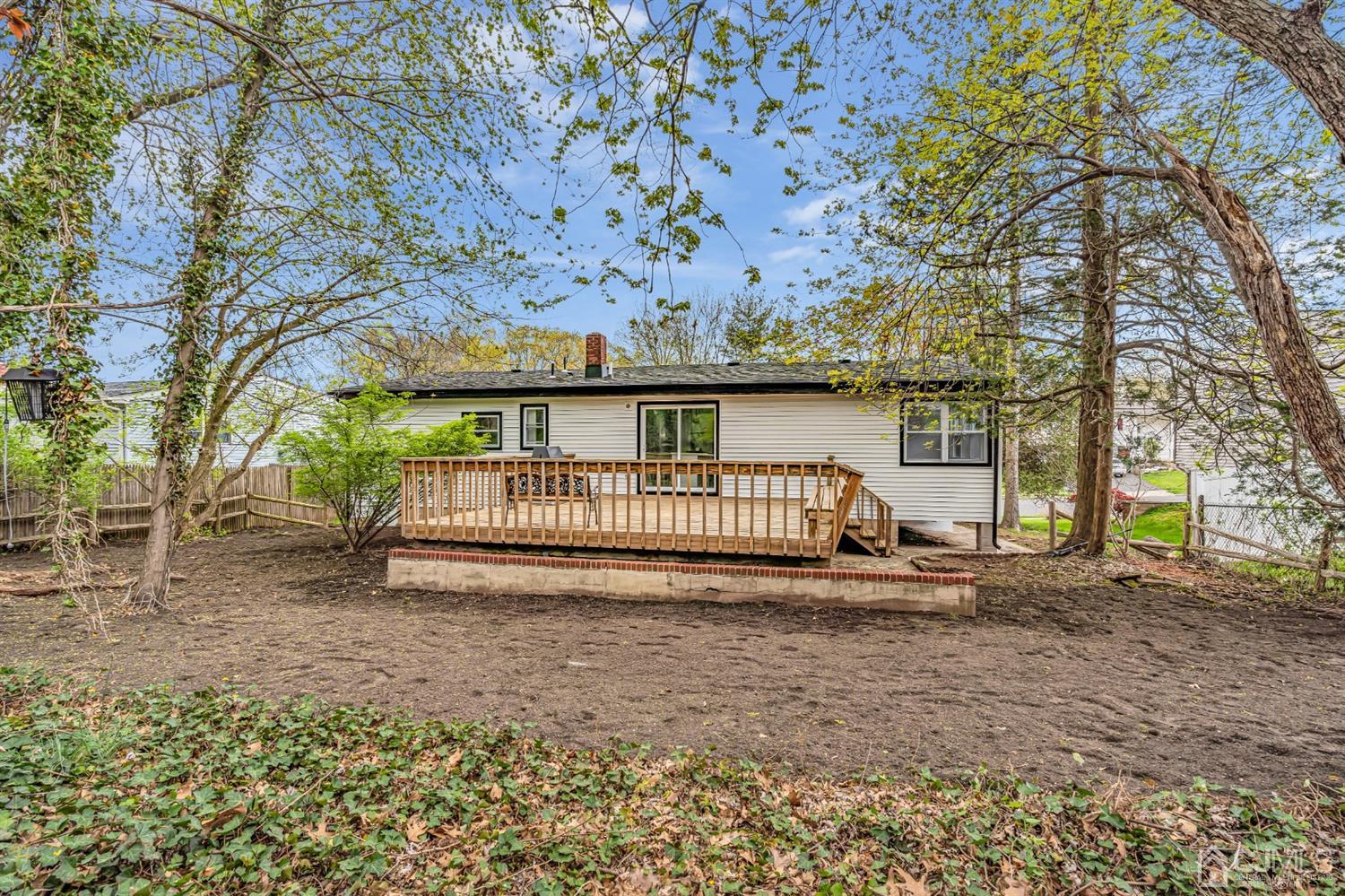 45 Harmon Road Edison, NJ 08837 - Photo 44 of 44 a view of a house with a yard and deck