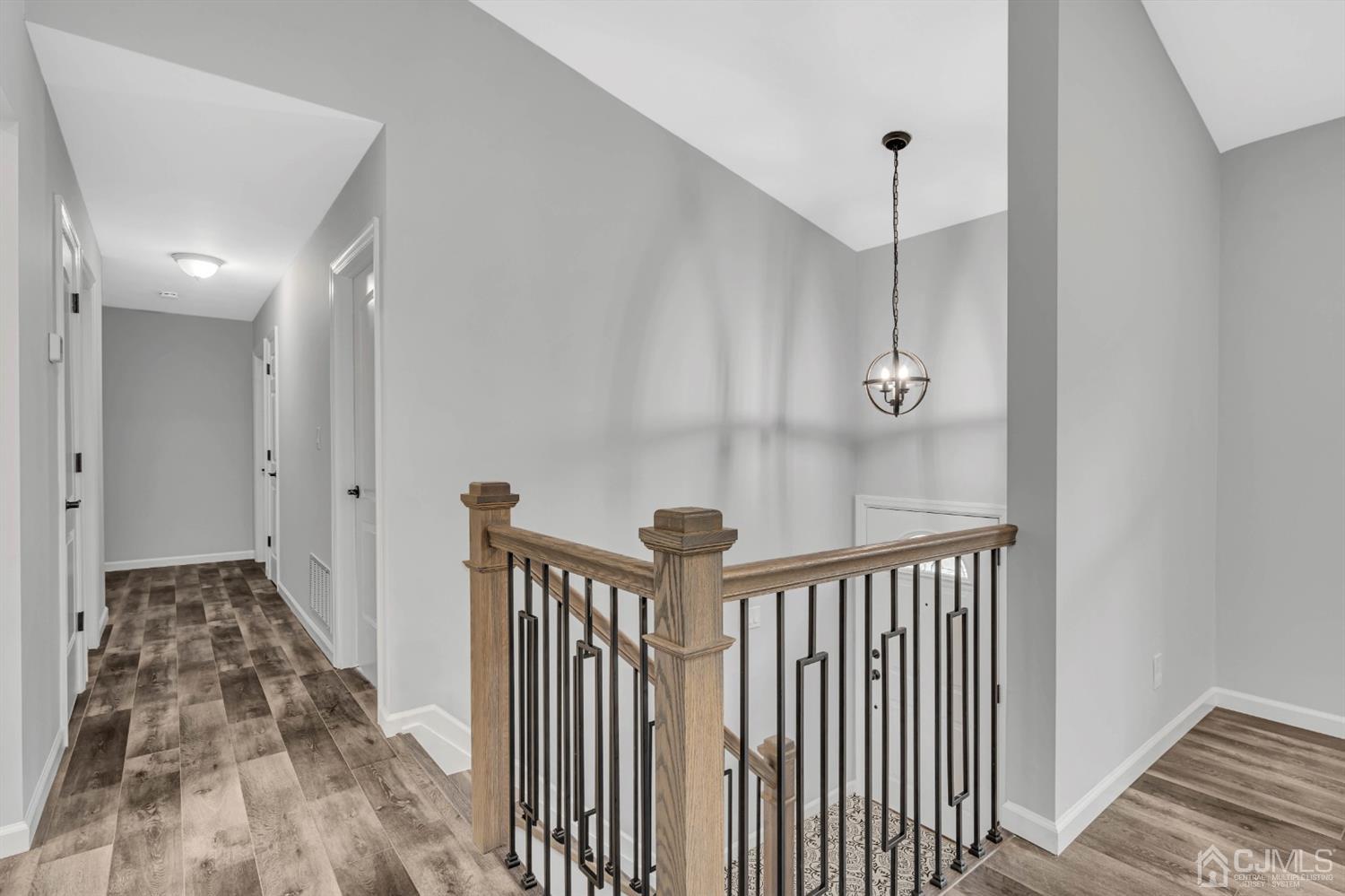 45 Harmon Road Edison, NJ 08837 - Photo 5 of 44 a view of a hallway with a door and stairs