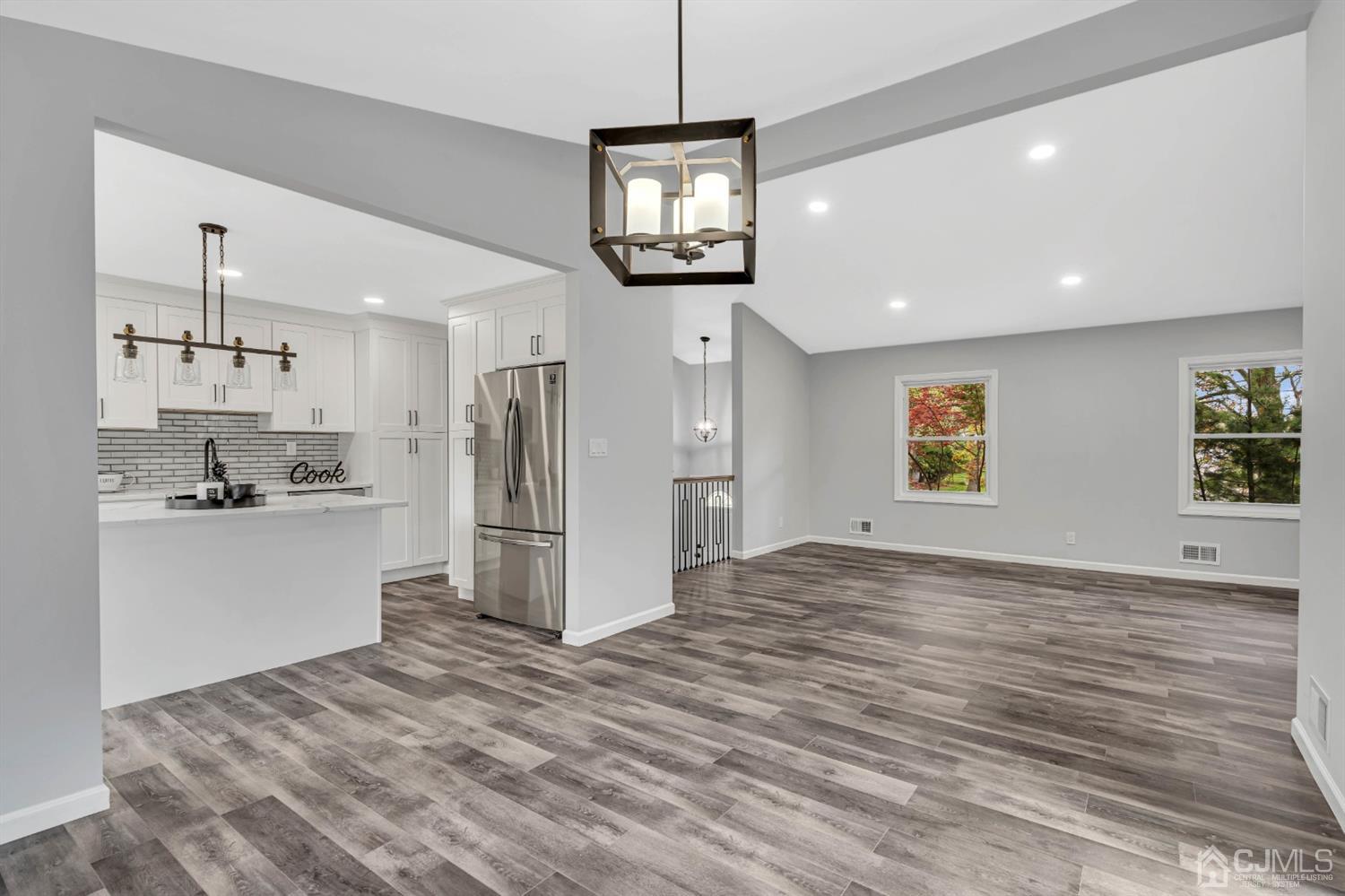 45 Harmon Road Edison, NJ 08837 - Photo 9 of 44 a view of a kitchen with refrigerator and wooden floor