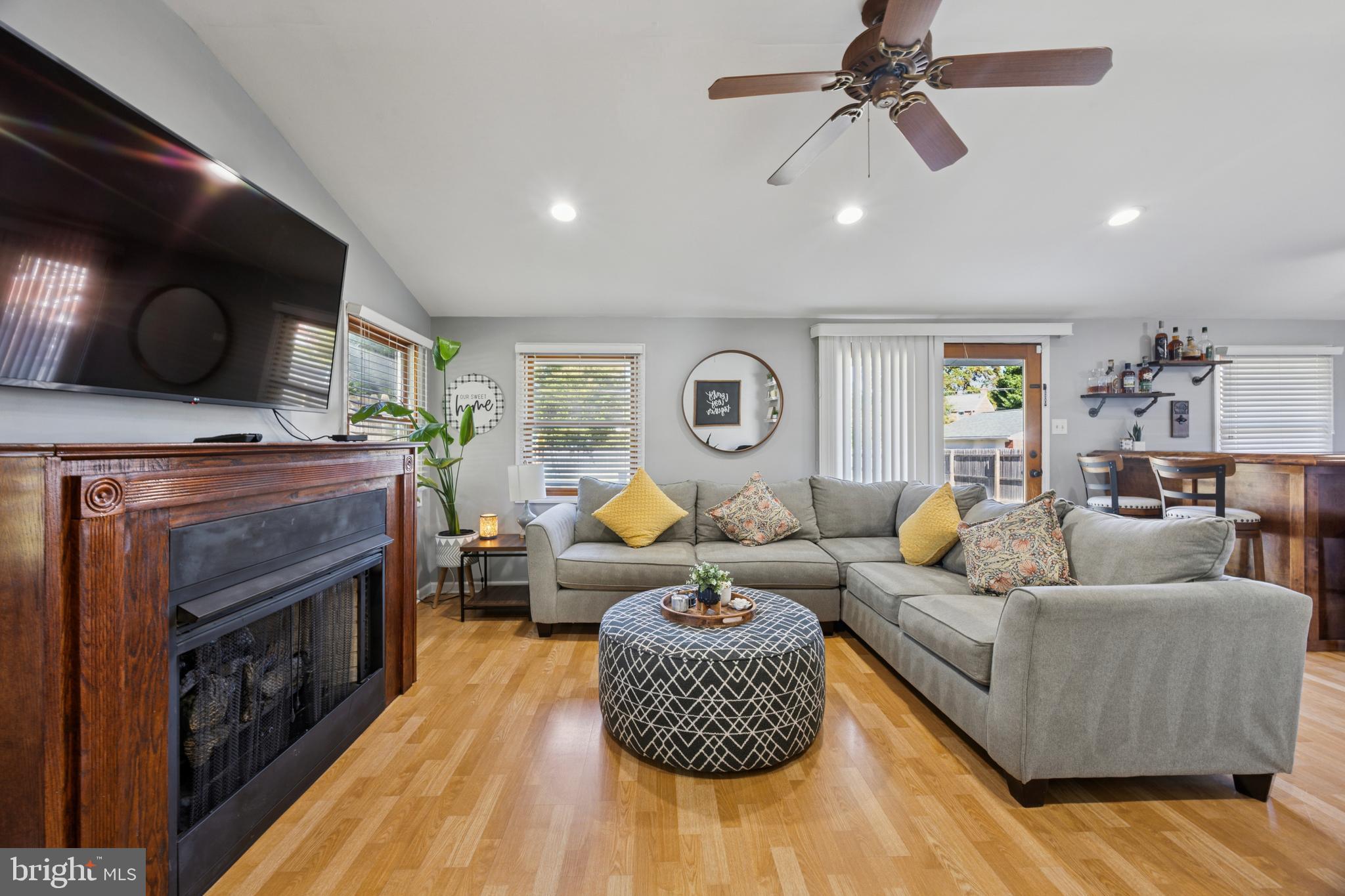 487 East Springfield Road Springfield, PA 19064 - Photo 11 of 29 a living room with furniture and a fireplace