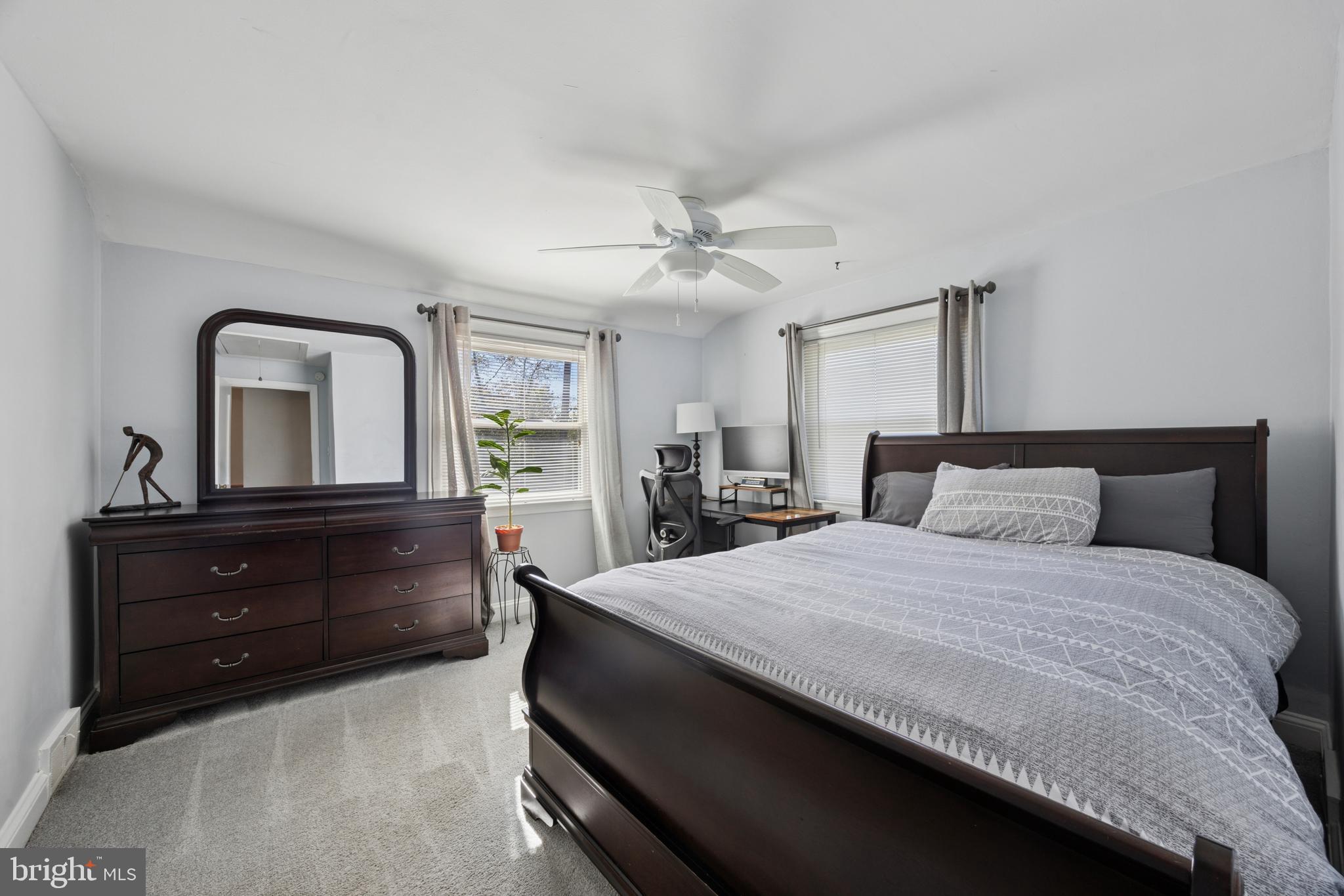 487 East Springfield Road Springfield, PA 19064 - Photo 21 of 29 a bedroom with a bed and a dresser