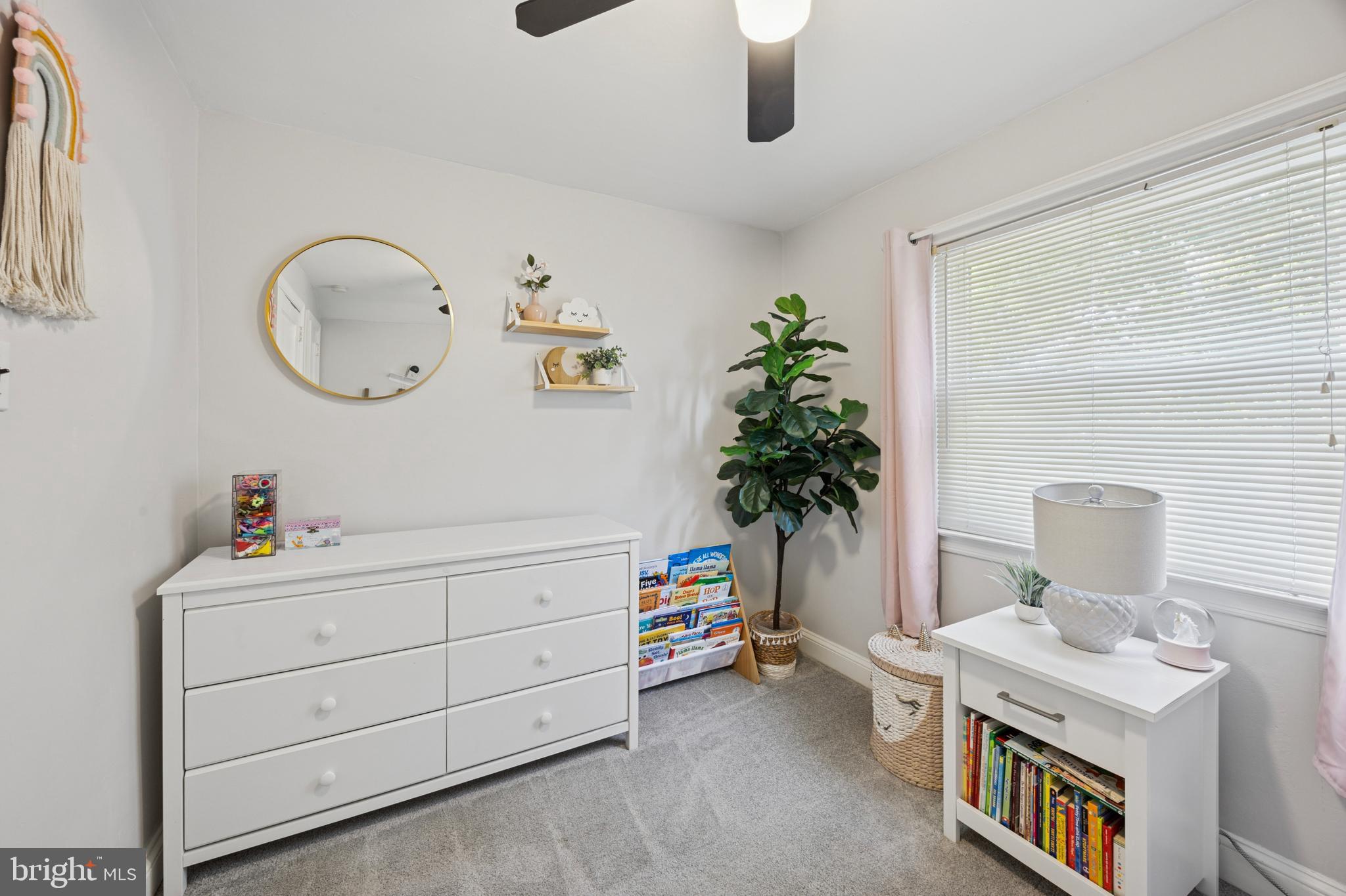 487 East Springfield Road Springfield, PA 19064 - Photo 24 of 29 a bathroom with a toilet a sink and a mirror