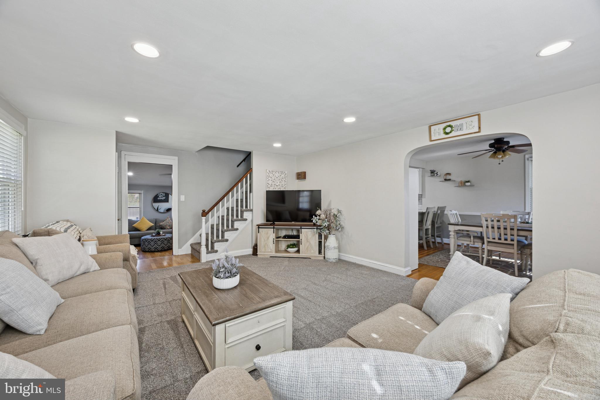 487 East Springfield Road Springfield, PA 19064 - Photo 4 of 29 a living room with furniture and a wooden floor