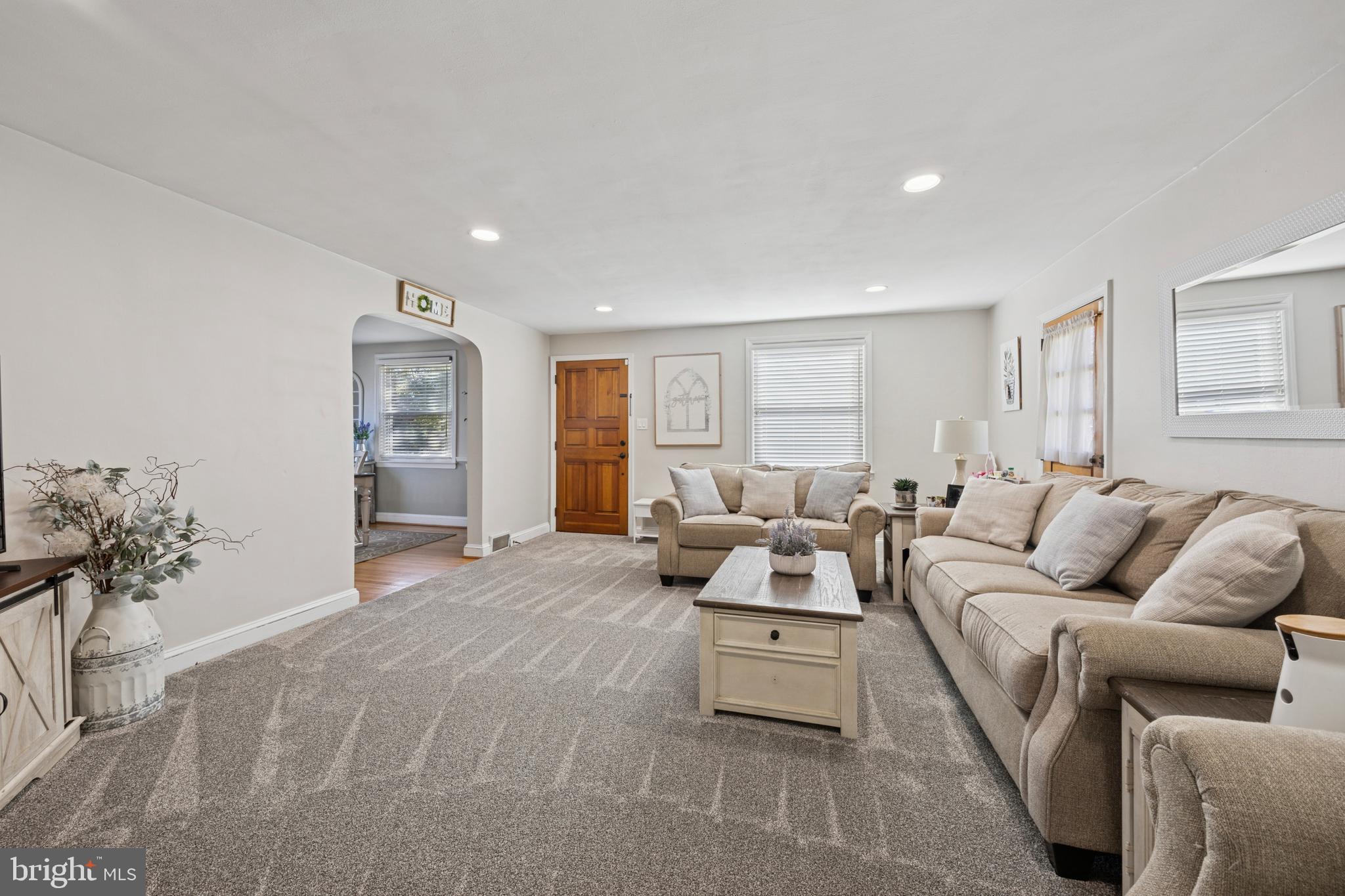 487 East Springfield Road Springfield, PA 19064 - Photo 5 of 29 a living room with furniture and a couch