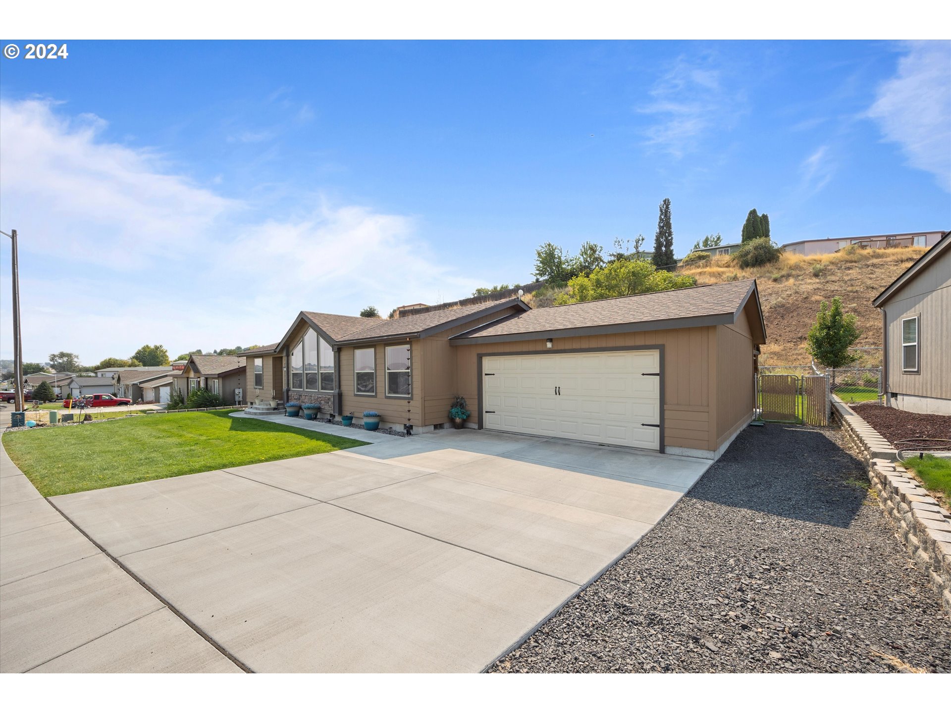 3076 Southwest River View Drive Pendleton, OR 97801 - Photo 3 of 37 a spacious bathroom with a sink and a yard