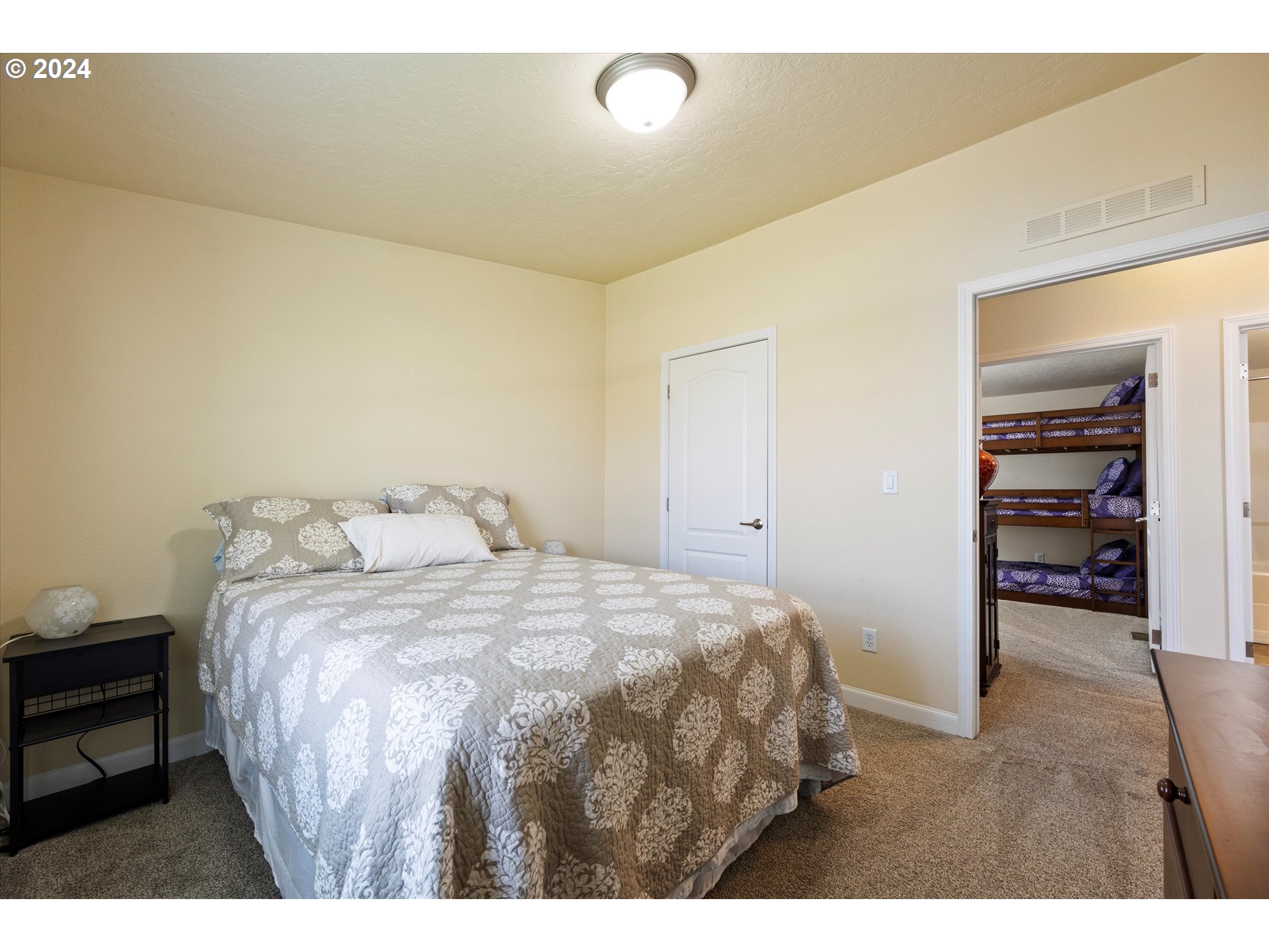 3076 Southwest River View Drive Pendleton, OR 97801 - Photo 8 of 37 a bedroom with a bed and a cabinets