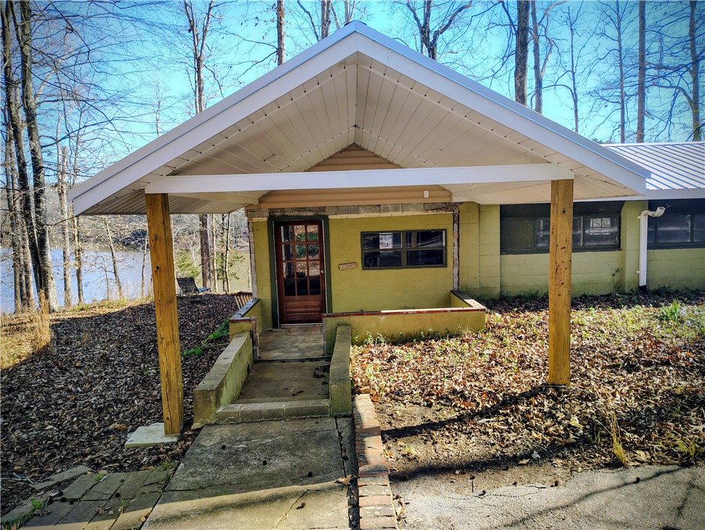144 Latham Drive Anderson, SC 29621 - Photo 18 of 39 This charming home features a cozy porch, offering a tranquil retreat with scenic views.