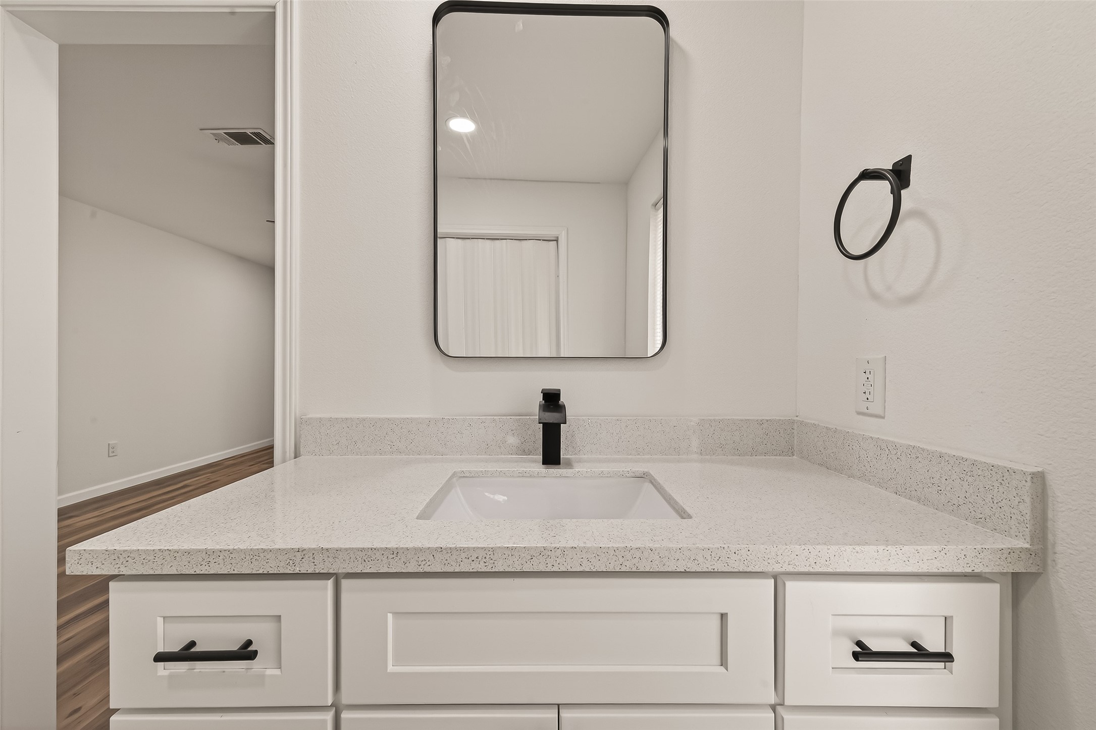 2915 Whispering Springs Drive Spring, TX 77373 - Photo 30 of 36 Clean and modern vanity with sleek hardware and bright, neutral tones.